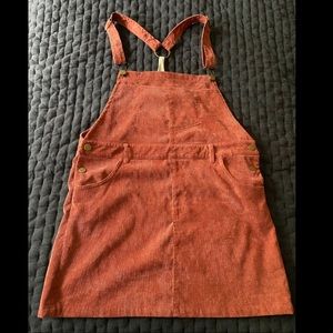 Burgundy overall dress with gold detail